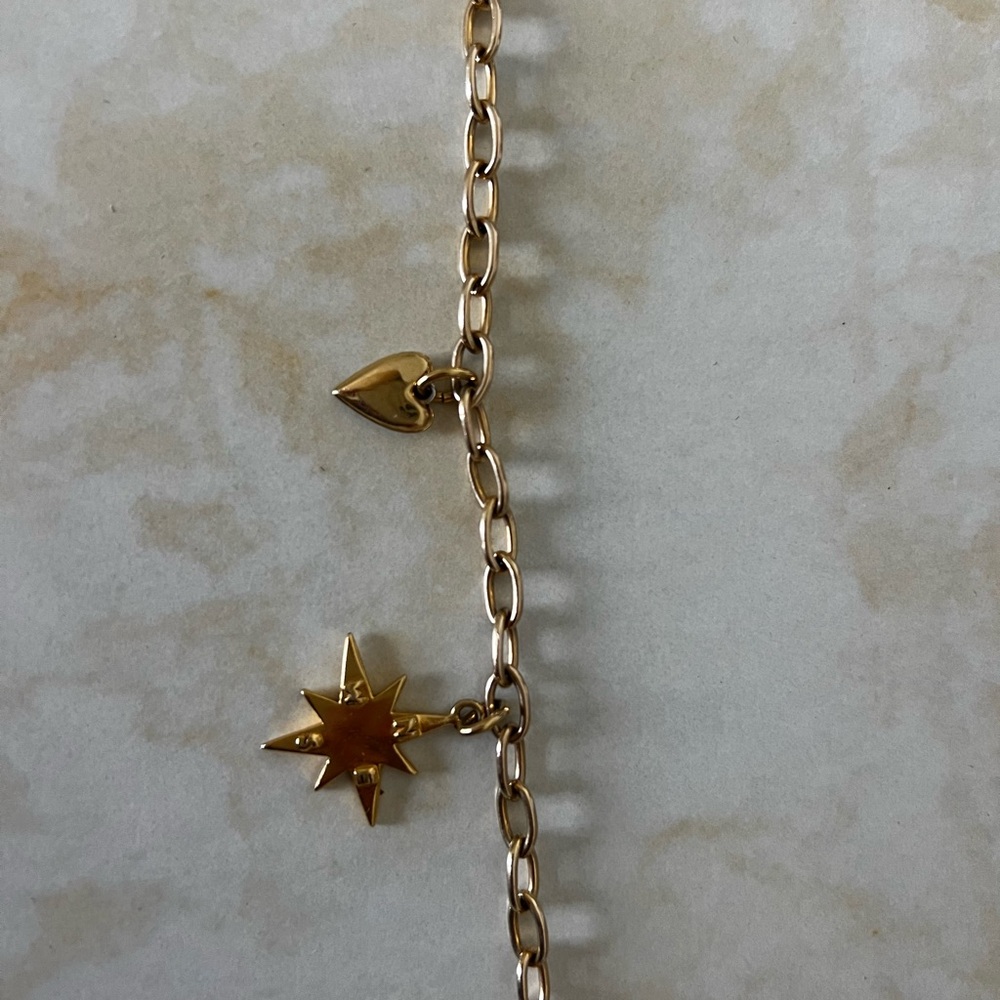 18K gold Hart Chunky bracelet chain
Two tone heart
Star compass - Picture 2 of 5